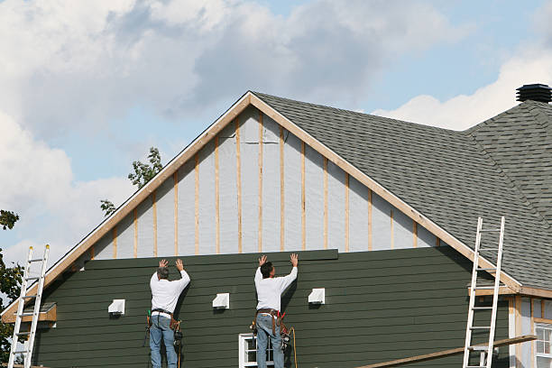 Professional Siding technician working in Parker, SC